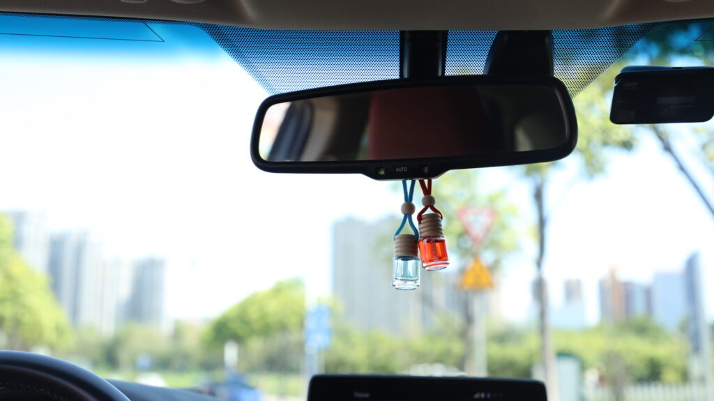 A liquid gel air freshener that changes color from blue to green in the light.