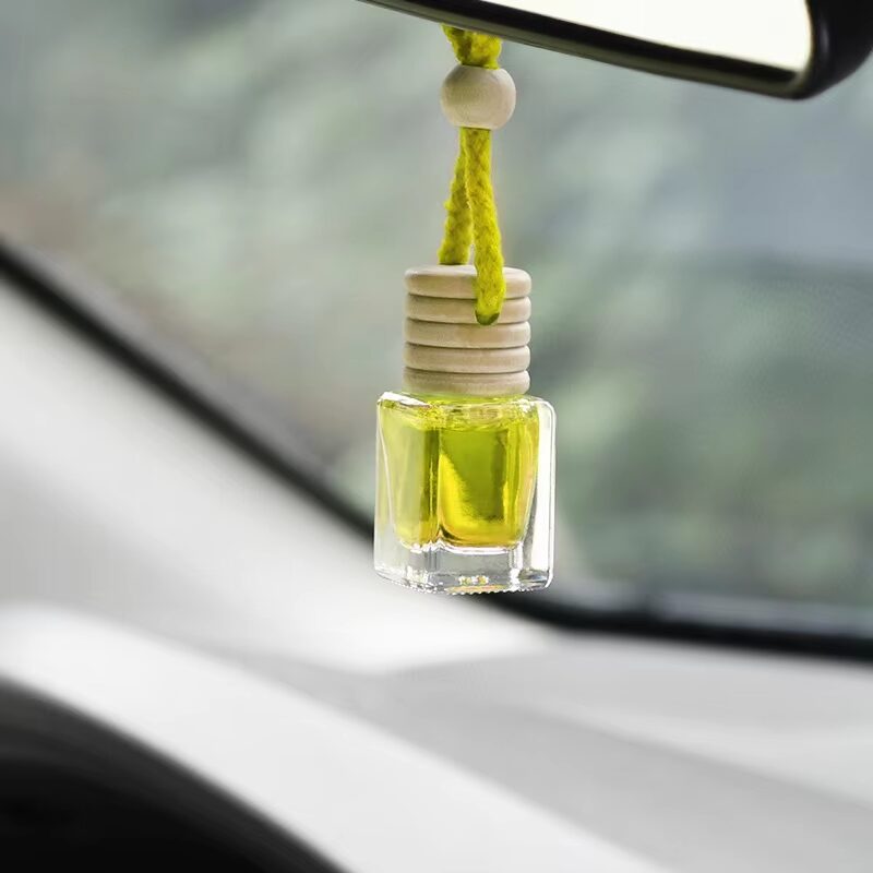 Elegant liquid car perfume clip for luxury brand collaborations.